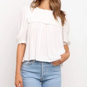 White petal and pup top